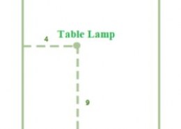 How will you describe the position of a table lamp on your study table to another person?